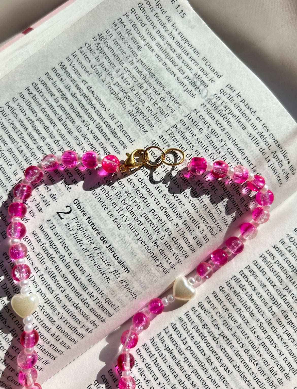 Chapelet de rétroviseur fuschia