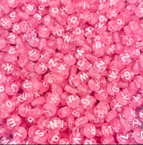 Perle rose écriture blanche